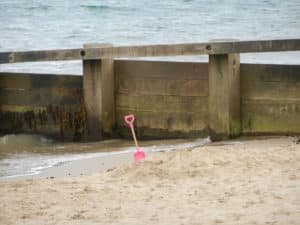 Forgotten (unwanted?) spade on Swanage Beach.
